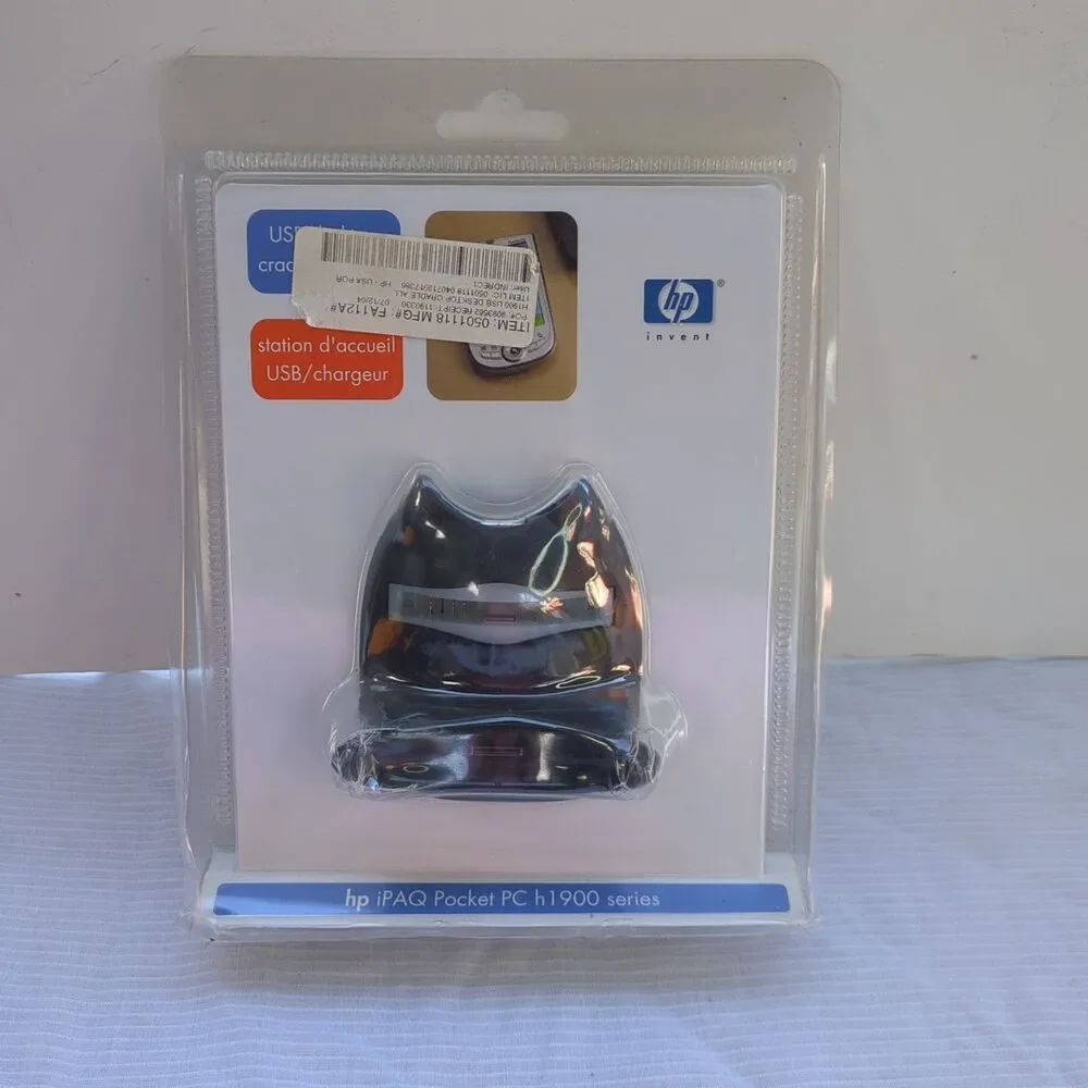 HP iPAQ Pocket PC h1900 series USB dock/charger.